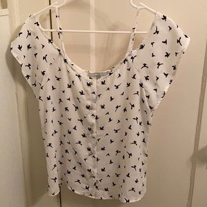 Open shoulder bird top